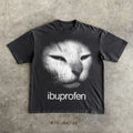 Black t-shirt with a cat graphic and 'ibuprofen' text on a textured surface